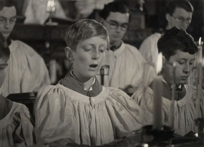 Still of chorister singing, taken from ‘Christmas Under Fire’, November 1940. (KCPH/2/16/1)