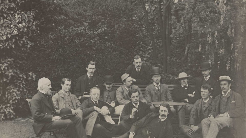 Apostles group photo, c.1883. J.K. Stephen (KC1878) is wearing a hat and smoking a pipe. [KCAS/39/4/1]