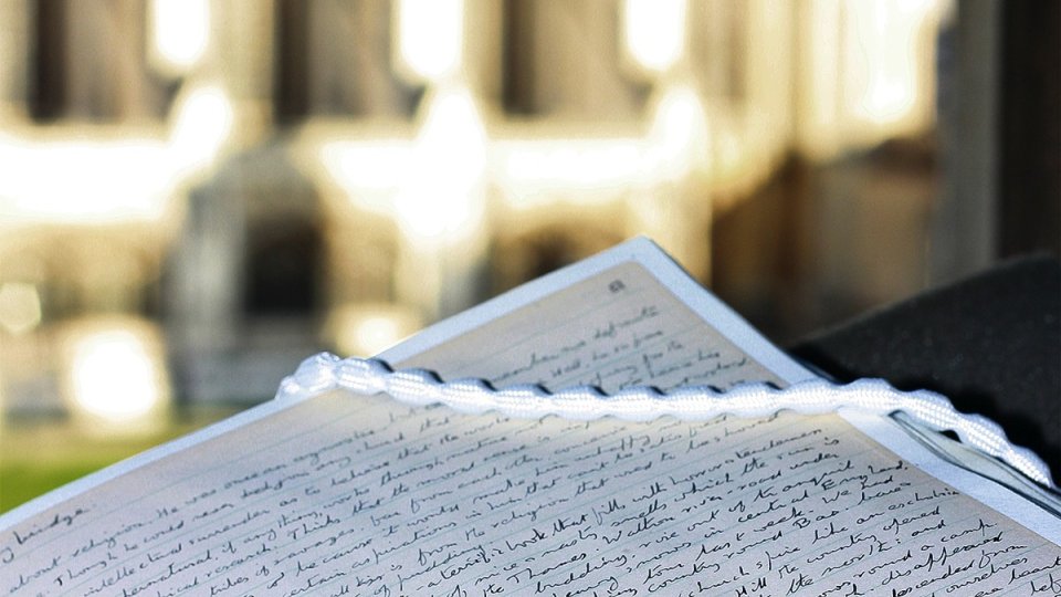 letter with Chapel in the background