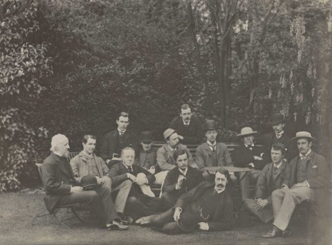 Apostles group photo, c.1883. J.K. Stephen (KC1878) is wearing a hat and smoking a pipe. [KCAS/39/4/1]
