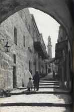 Photograph of a street in Jerusalem. Illustration in Report by Mr. C.R. Ashbee on the Arts and Crafts of Jerusalem and District. [CRA/21/1, Arts and Crafts, p.44av] 